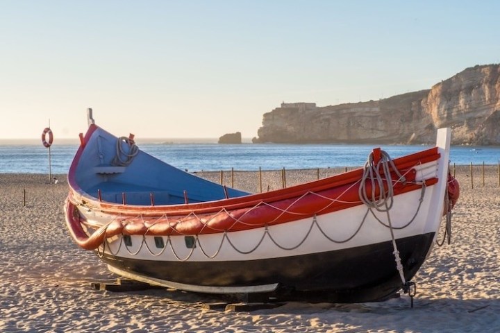 a small boat in a body of water